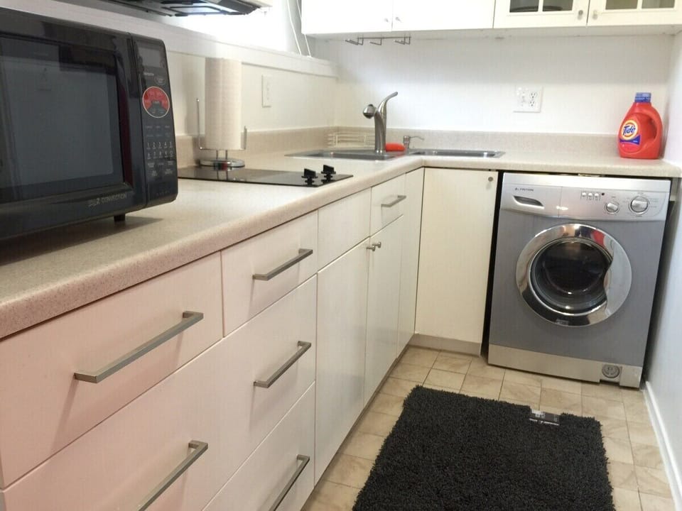 Washer, Dryer, has been replaced with top loading machine &  baking electrical oven. 