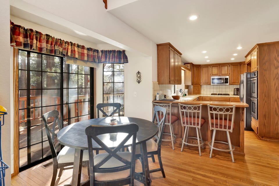 Inviting dining area designed for comfort and connection. The space feels open and airy, with a warm atmosphere that makes everyday meals and special gatherings equally enjoyable.