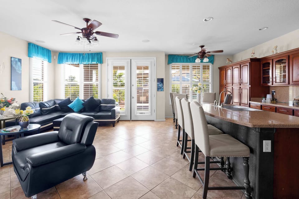 Experience seamless living with our open floor plan, where the kitchen and living room blend effortlessly.