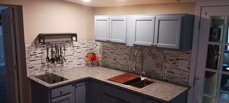 kitchen.  bedroom to the left door, living area to the right doors