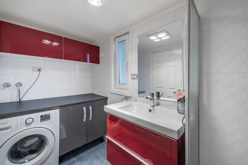 Ensuite off the Main bedroom - Bedroom 1. Laundry is also located here