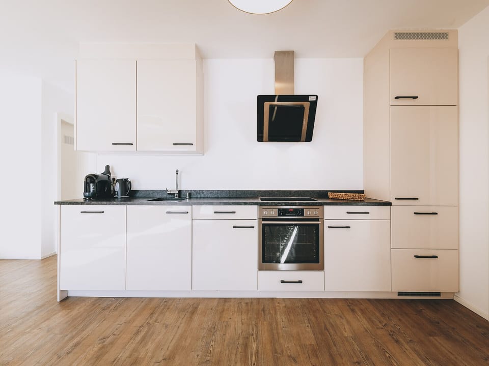 Fully equipped kitchen in our holiday apartment Apartments Goldbergblick by We Rent.