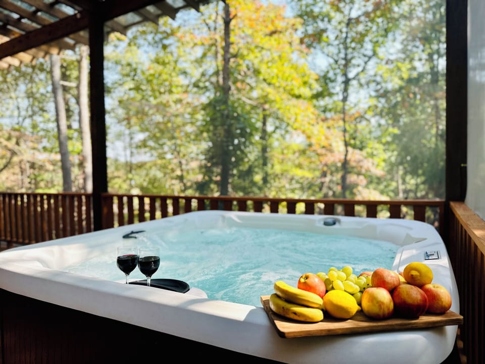 Relaxing Hot Tub Retreat: Soak in the bubbling hot tub and unwind in style. 