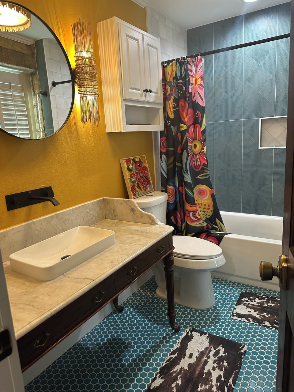 Decorative tile bathroom attached to bedroom four