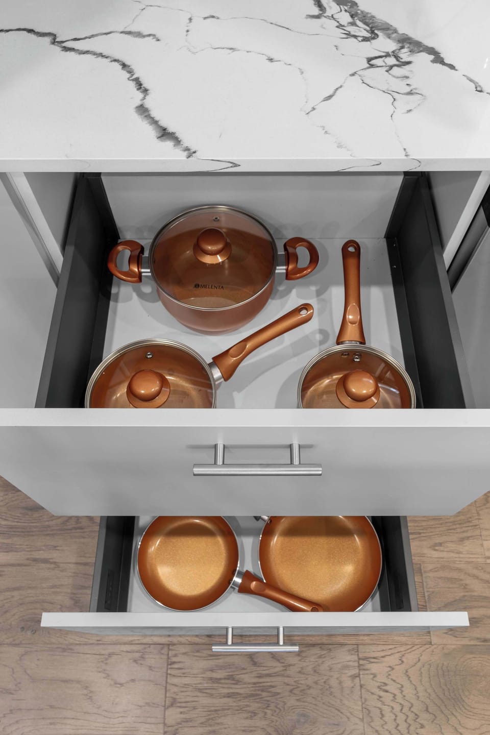 Open shelving displays everyday dishes for quick, no-fuss access.