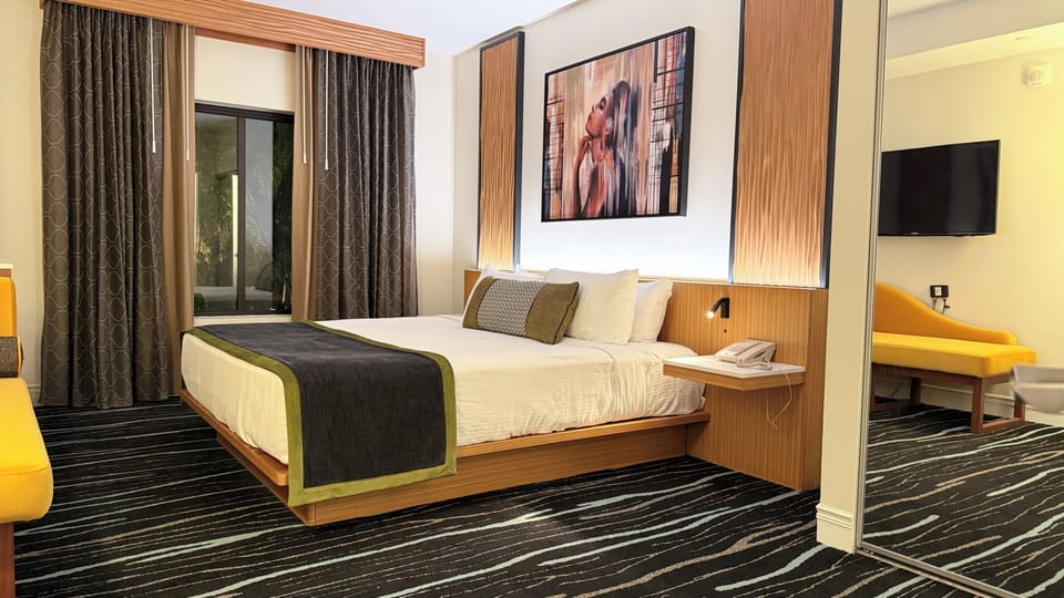 Bedroom with king bed and premium bedding