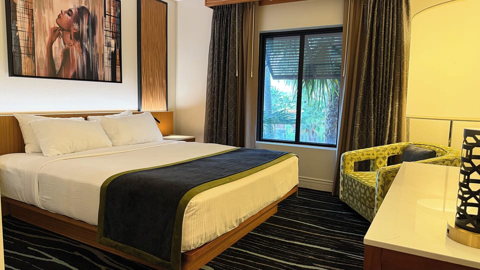Bedroom with king bed and premium bedding