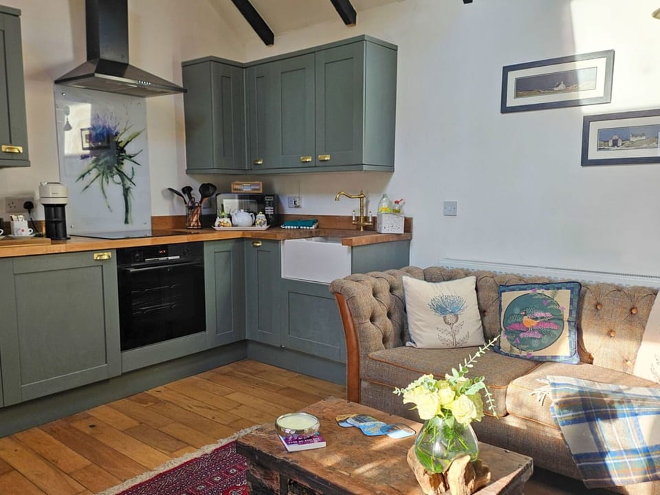 Furniture, Interior Design, Flooring, Wood, Countertop, Kitchen, Cabinetry, Floor, Kitchen Appliance, Ceiling