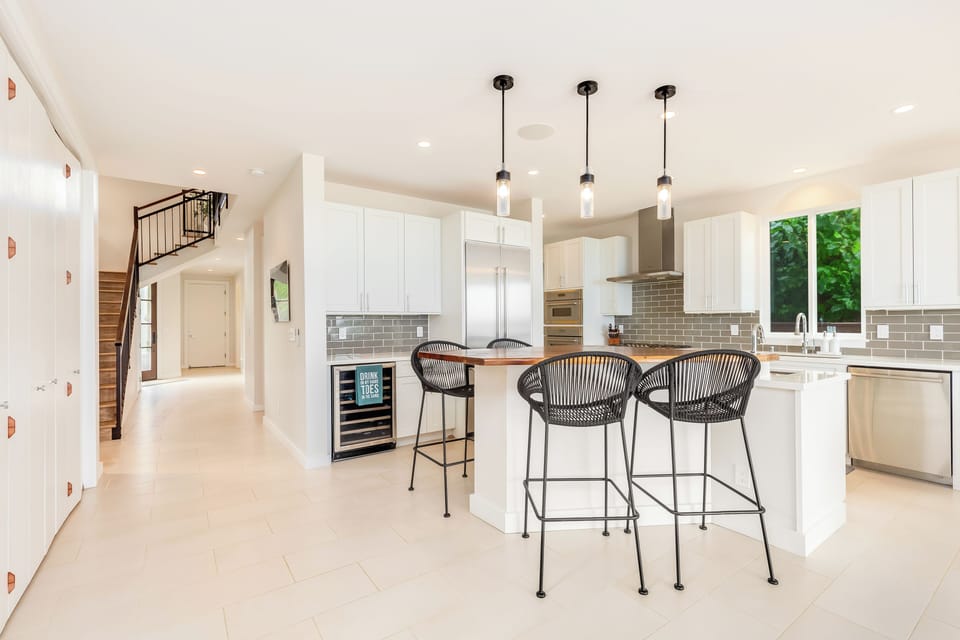 Pull up a stool at the island while dinner comes together an arm's reach away.