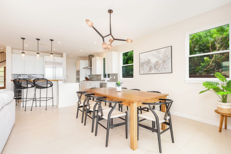 A dining table with room to gather, set just off the kitchen where the day's meals come together.