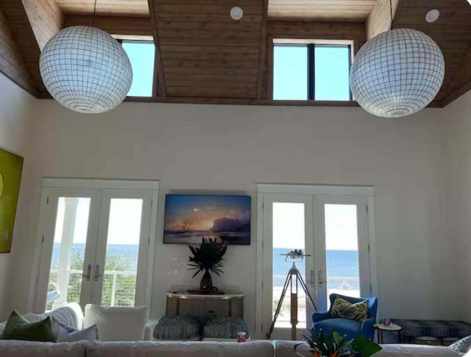 Vaulted wooden ceiling with windows overlooking the Gulf of Mexico