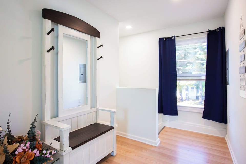 As you come upstairs, you'll arrive at a landing area to sit, relax and settle .