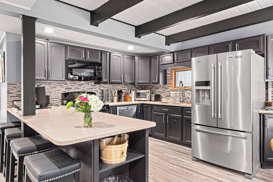 Fully equipped modern kitchen is ready for your culinary creations.