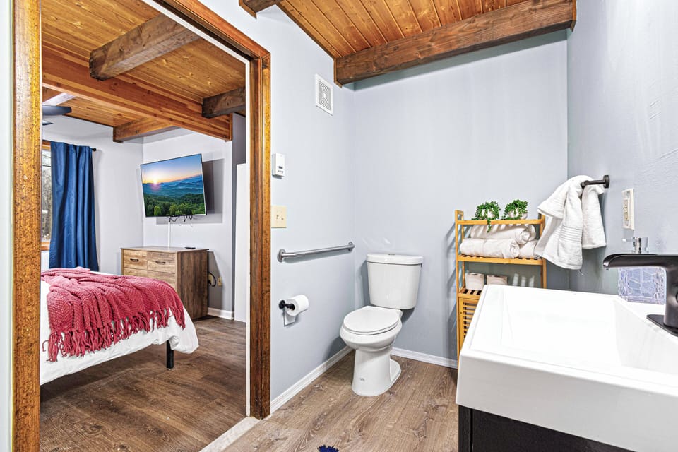 The main-level bedroom's full bathroom, complete with essentials!