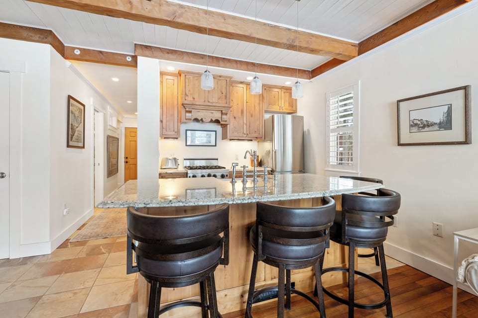 Full kitchen with seating at island