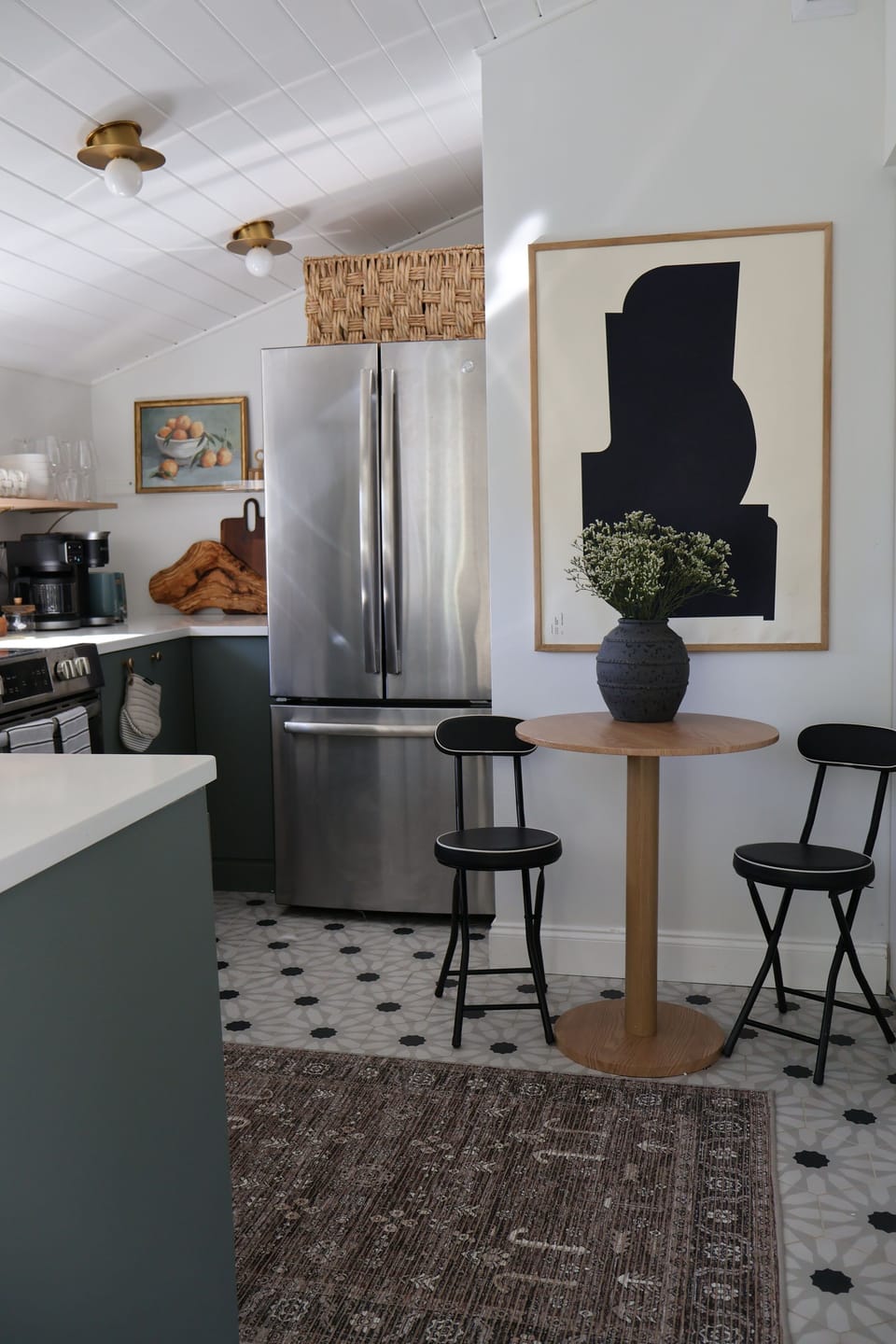 Dining area for 2 where chairs can be tucked away and hung when not in use