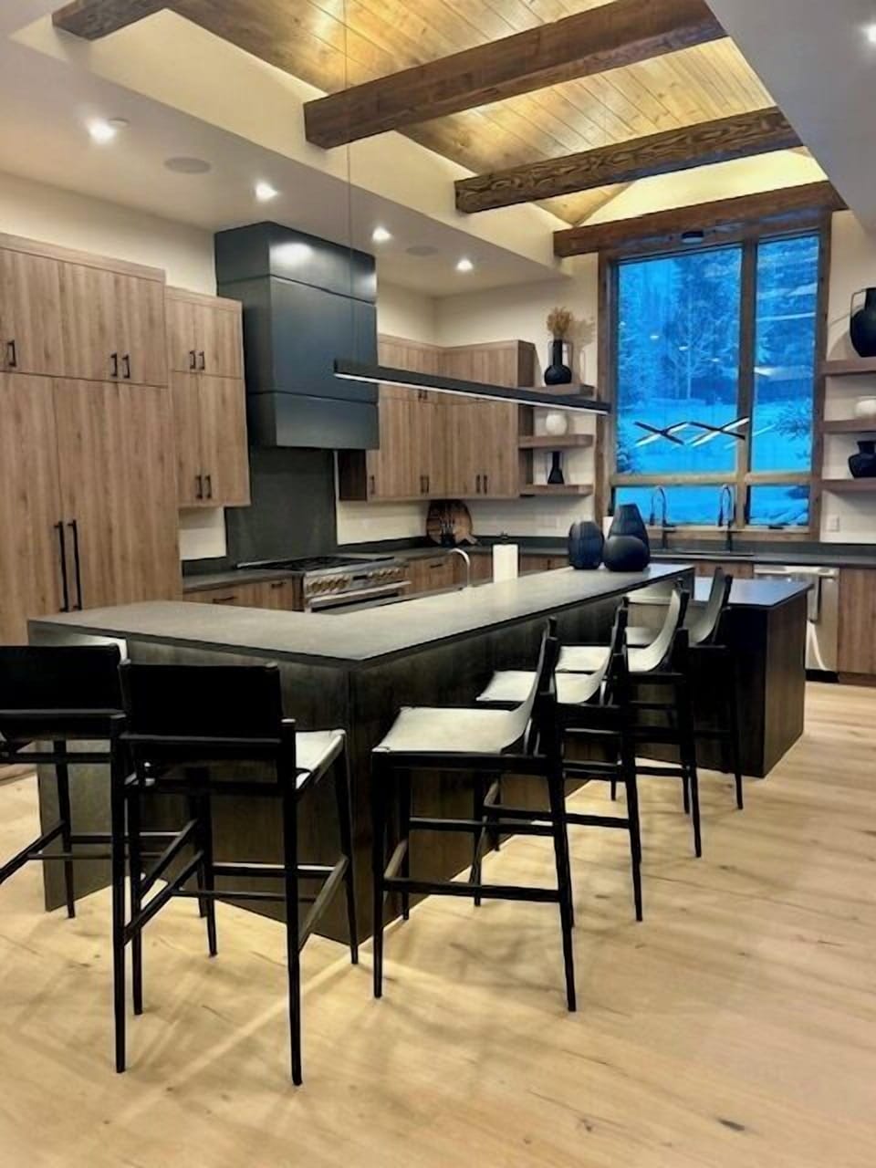 Kitchen has dramatic lighting you have to experience to really appreciate, beamed ceiling...truly beautiful space.  