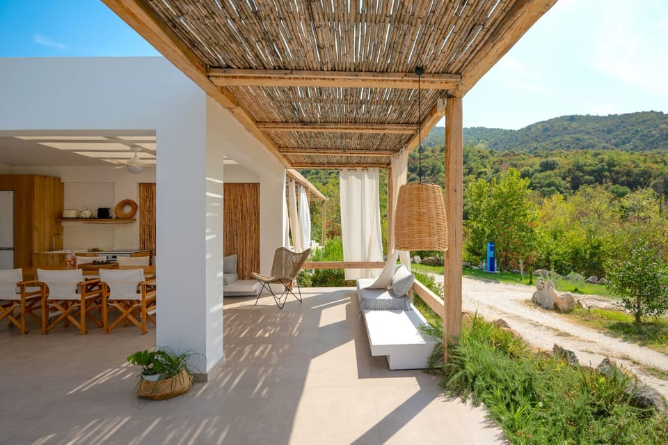 Poolside relaxing area with mountain view