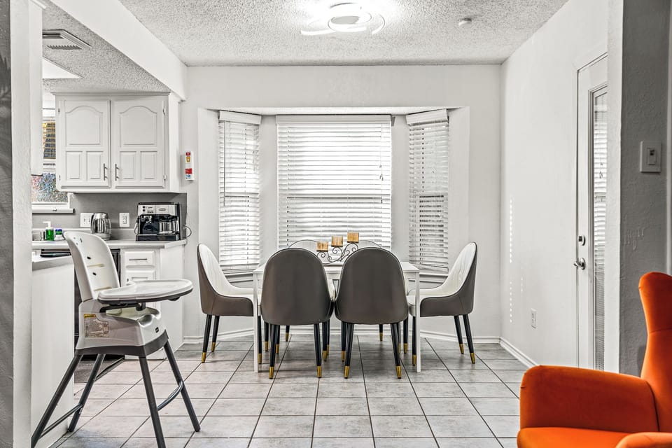 “Cozy dining nook with natural light, perfect for family meals.”