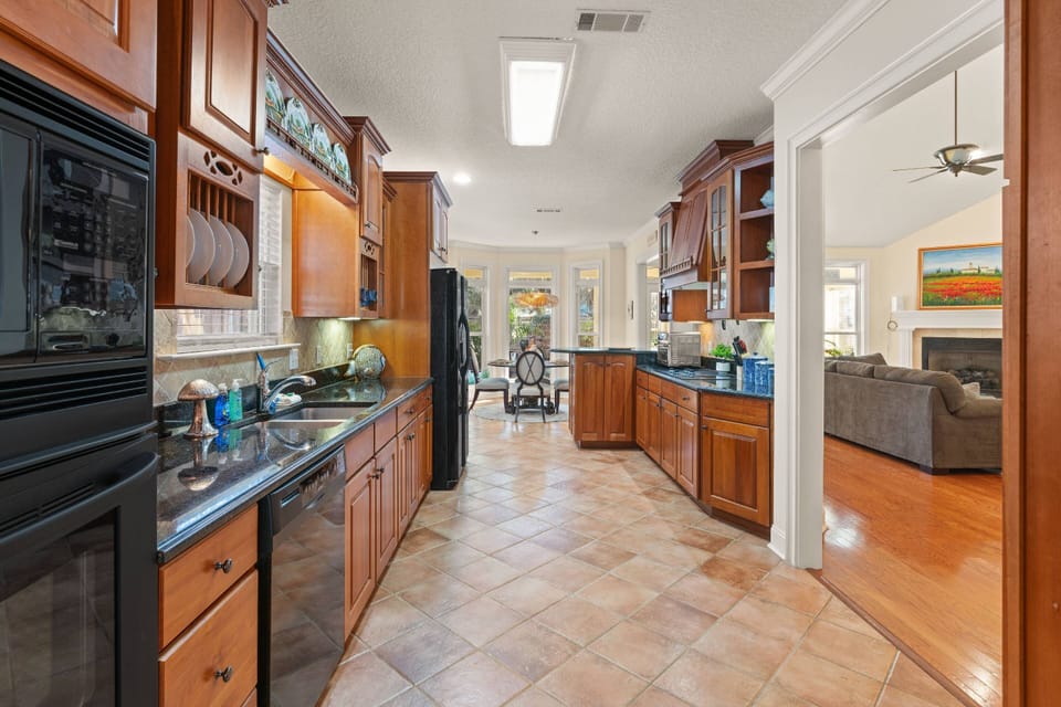This beautiful, inviting kitchen just off the living room has space for the whole family and comes fully stocked with everything you need.