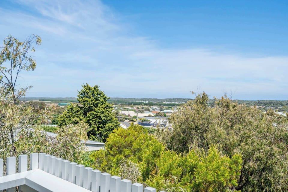 Welcome to Ocean Breeze and Sweeping Coastal Views, where breathtaking 180° vistas stretch from the rolling dunes to the sparkling ocean