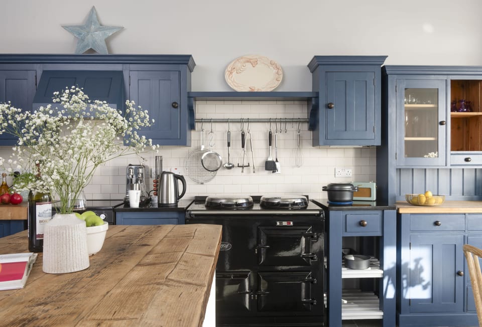 Henscath House, Mullion. Ground Floor: The kitchen is superbly equipped with everything you'll need during your stay, including this characterful electric aga