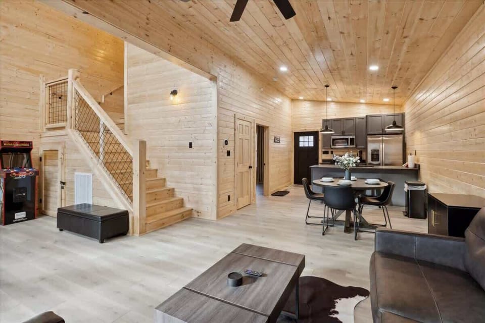 Living Area: Bright, airy space with chic decor, perfect for relaxation and fun game nights!