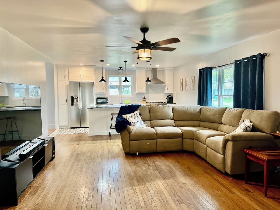 Open concept living room / kitchen.  There is large island with 2 bar stools for entertaining. 