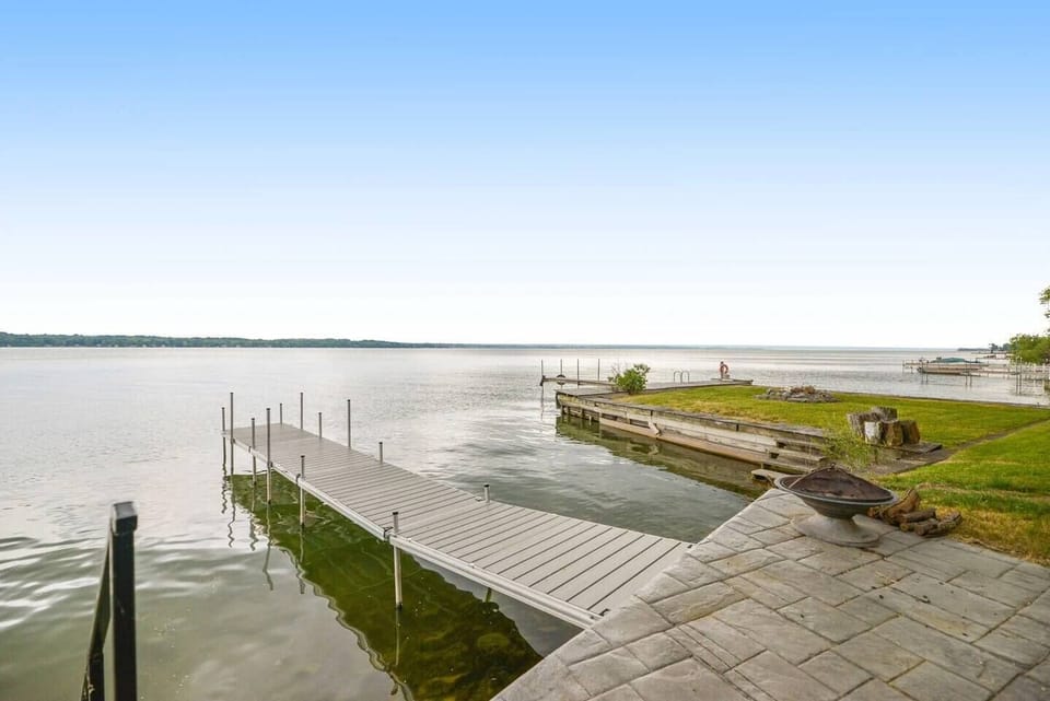 Relax on our beautiful concrete patio with the dock leading out to beautiful Cayuga lake.