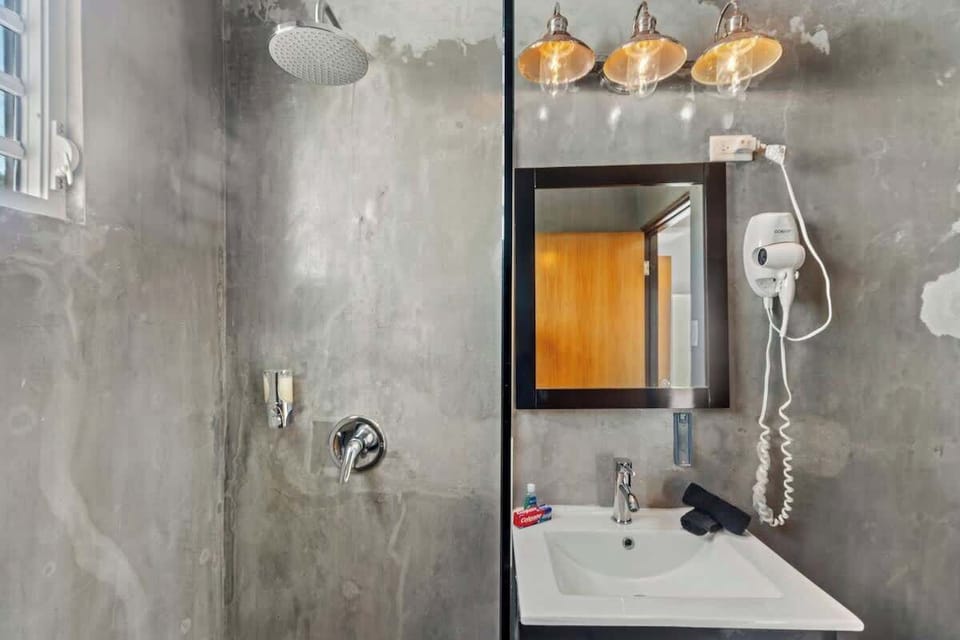 Sleek, modern bathroom with all essentials.

