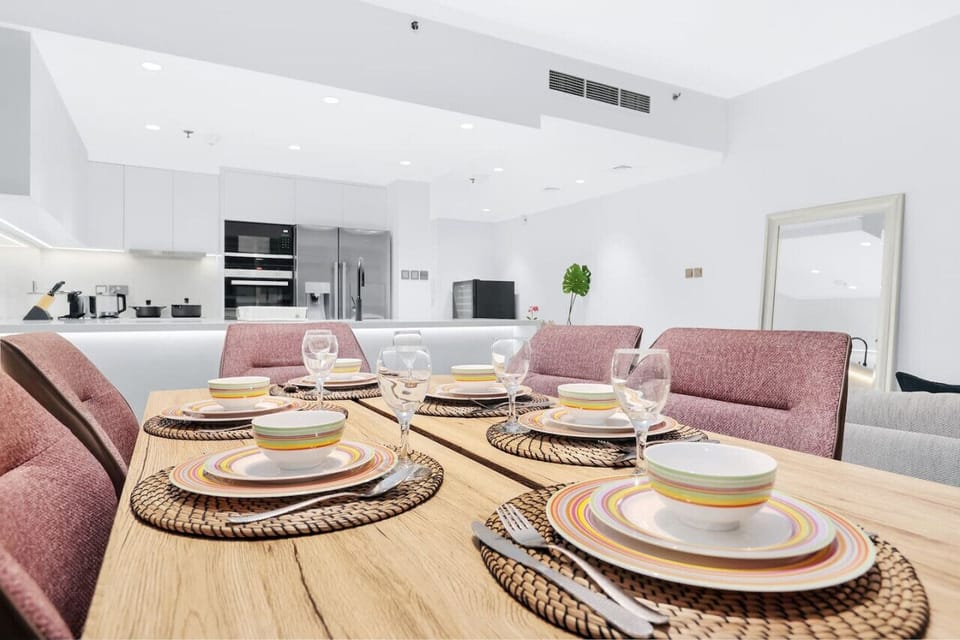 Dining Area: Elegant ambiance with vibrant dishes, perfect for memorable meals in Dubai!