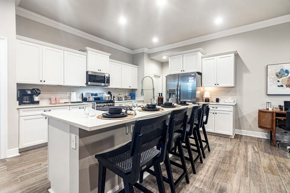 Here’s another view of the sleek and spacious kitchen island, a centerpiece for entertaining and daily living. Located in the best Airbnb in Lake Charles, this pet-friendly home ensures comfort and convenience with its modern design and thoughtful amenities.