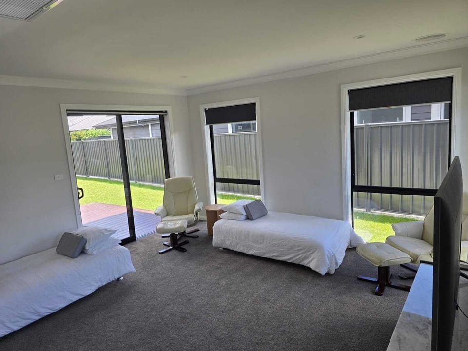 TV room with two sofa beds