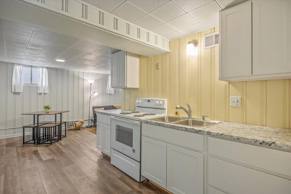 Newly added kitchen to downstairs space.
