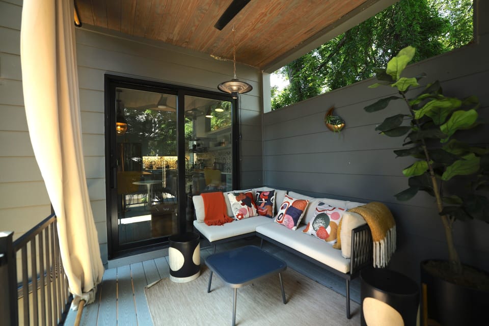 Take in the fresh air from the private covered porch.