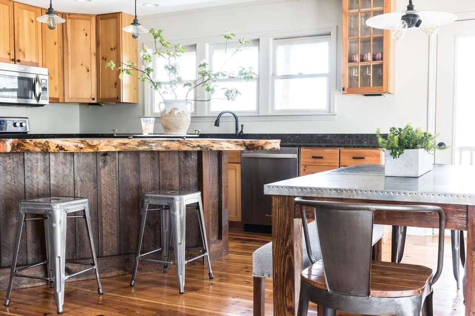 Fully stocked kitchen with microwave, double oven, and dishwasher