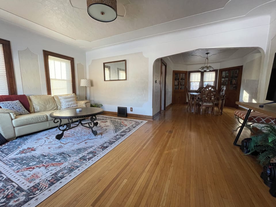 Enter into the main living room. Pass into the exquisite dining room for 6.