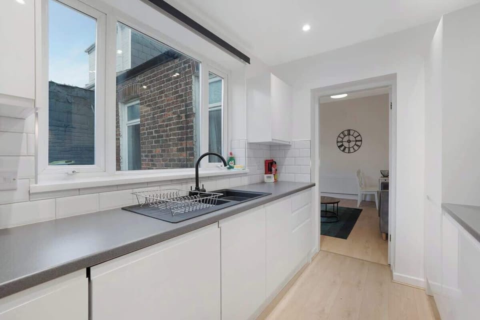 Family-friendly kitchen oasis equipped with all essentials, including a washer & dryer, oven, fridge and full cookware set. Plus, thoughtful touches like children's dinnerware ensure everyone feels right at home in this cozy culinary haven.