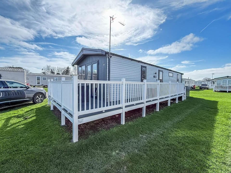 Whether you're planning a dog-friendly short break or a static caravan holiday, the living room of a caravan at Broadland Sands Holiday Park Lowestoft offers a welcoming space to unwind.