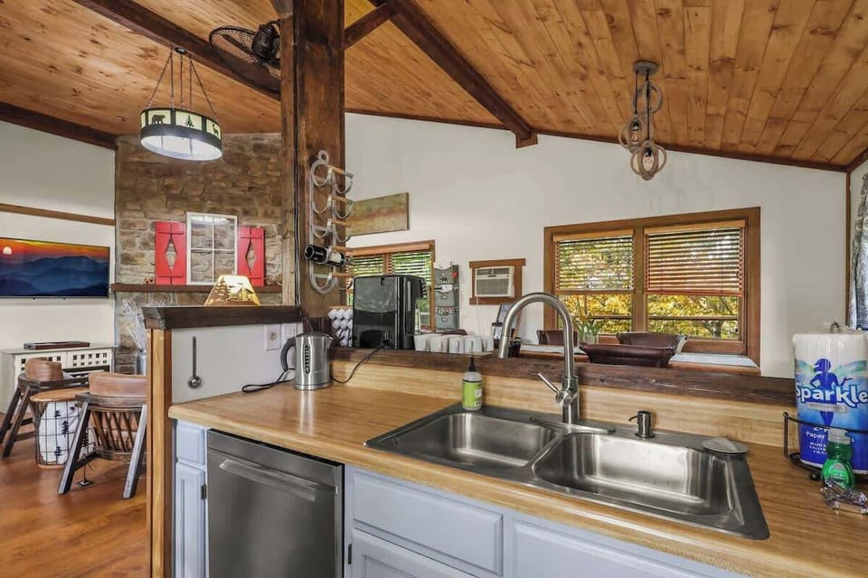 Create culinary delights in our house with a well-equipped kitchen. Experience the joy of cooking in a modern and functional space.
