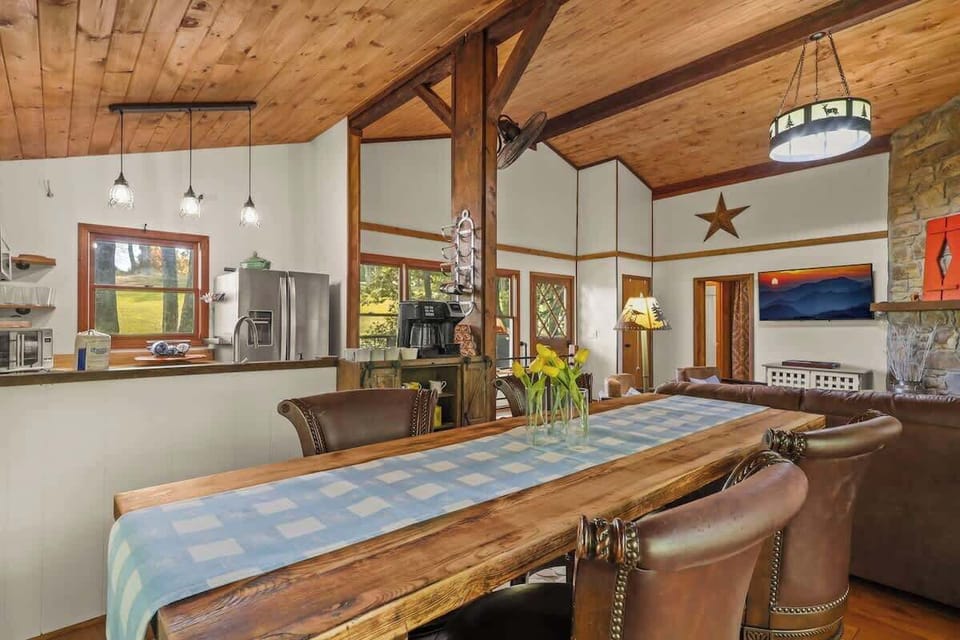 Dine in style with our house featuring a spacious dining area. Enjoy your meals in the comfort of a well-appointed space.