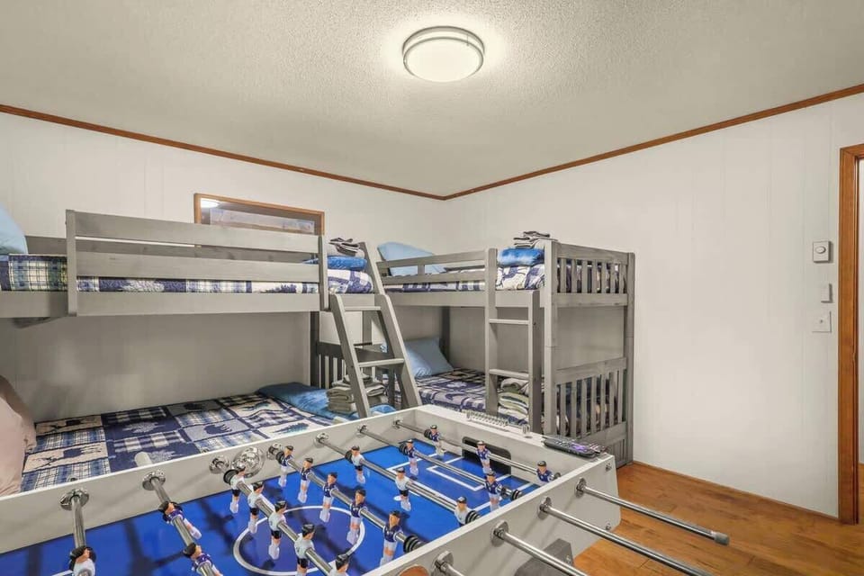 Add a touch of fun to your stay in our house with an exciting foosball table right in the bedroom. Experience leisure and entertainment in the comfort of your private retreat.