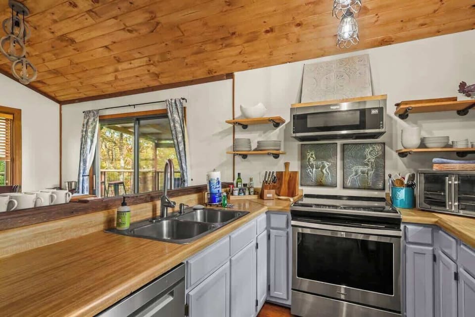 Savor the pleasure of cooking in our house with a spacious kitchen. Explore your culinary skills in a setting that balances efficiency and style.
