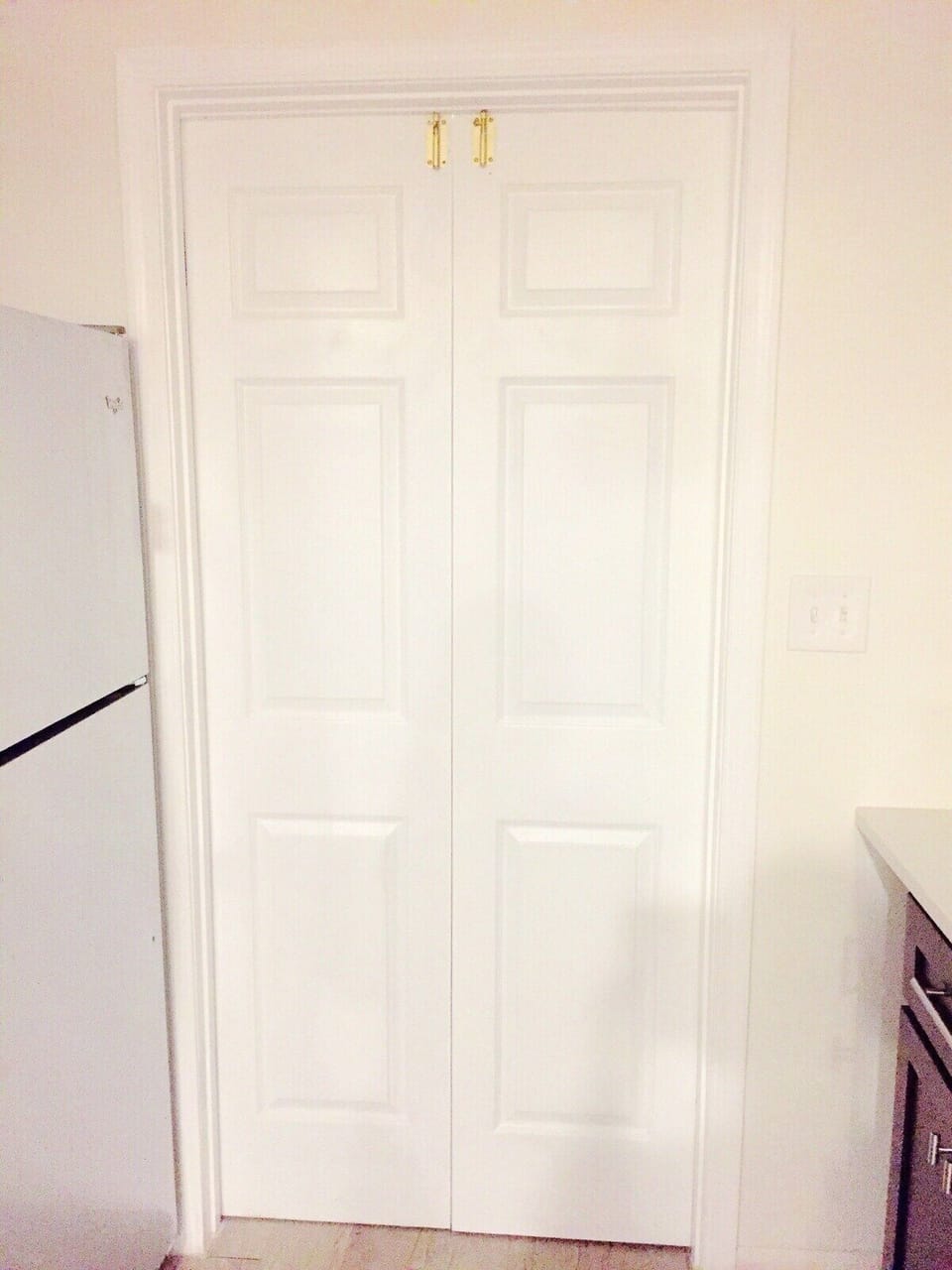 Kitchen back door to the  shared area of laundry room 