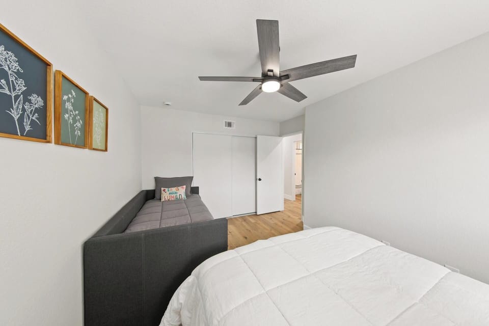 Bedroom with ceiling fans