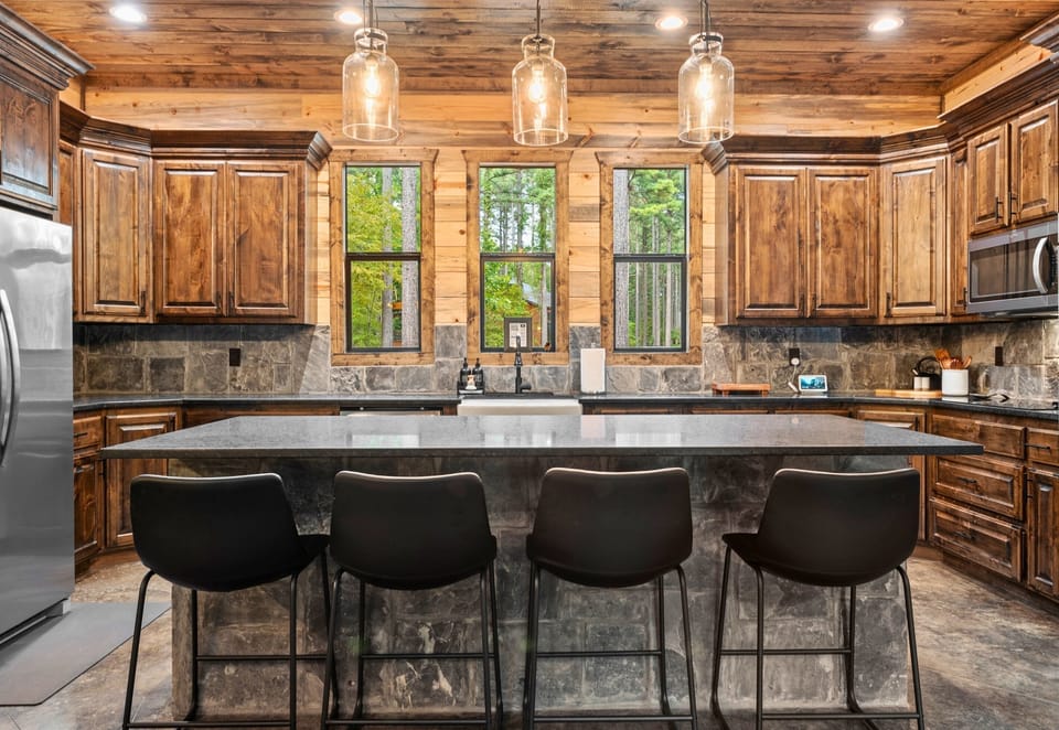 The kitchen’s bar seating is perfect for casual dining or keeping the chef company while they cook.