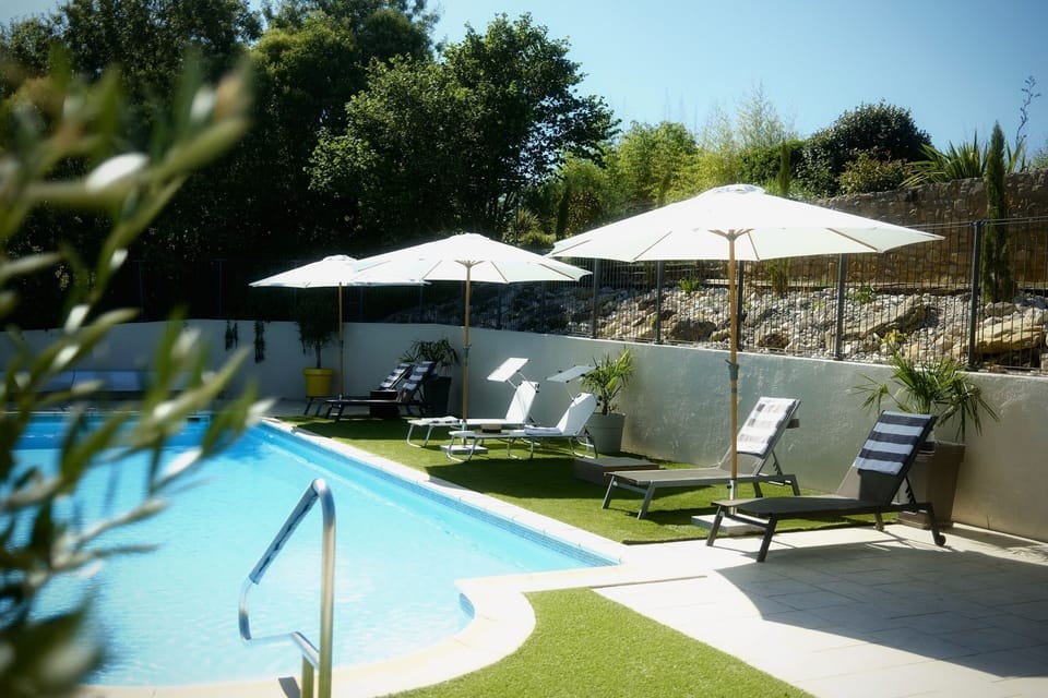 Heated swimming pool at Le Domaine de Loustalviel
