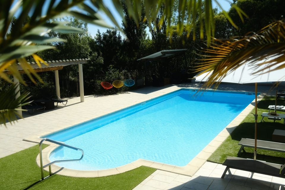 Heated swimming pool at Le Domaine de Loustalviel