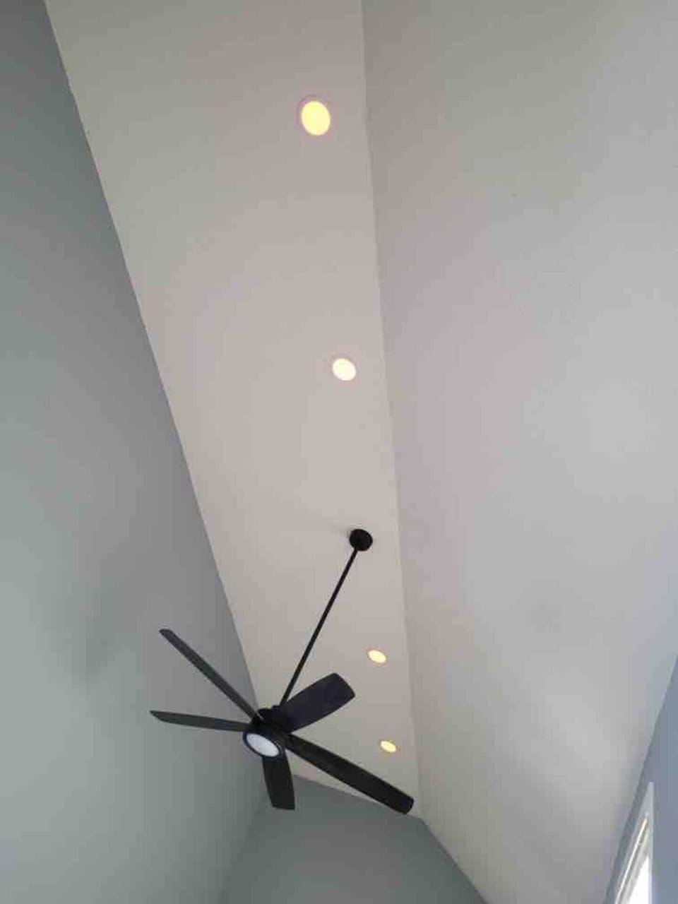 Ceiling fan and recessed lights in living room 