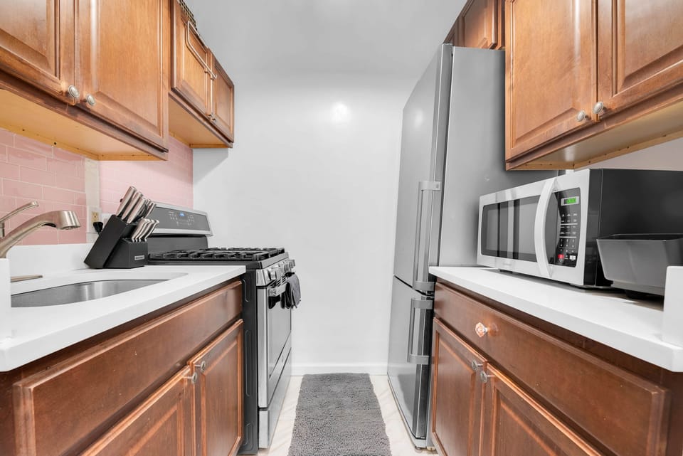 Stainless steel fridge and stove.